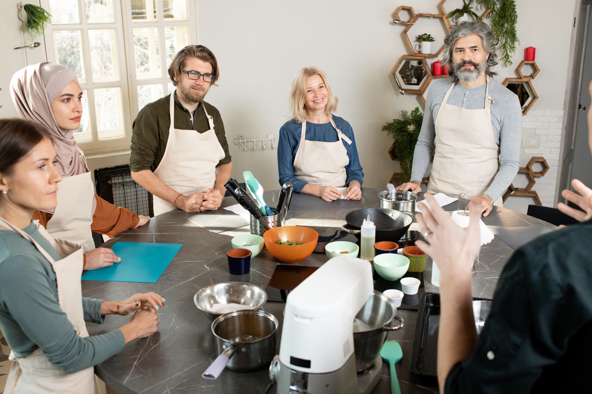 Cozy workshop kitchen with participants